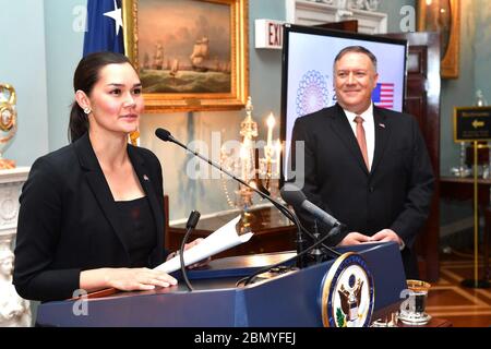 Secretary Pompeo Listens as Assistant Secretary Giuda Delivers Closing Remarks U.S. Secretary of State Michael R. Pompeo listens as Assistant Secretary for Public Affairs Michelle Giuda delivers remarks at a reception supporting the U.S. Pavilion at Expo 2020, at the U.S. Department of State in Washington D.C. on July 29, 2019. Stock Photo