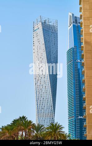 DUBAI, UAE - MARCH 2, 2020: The futuristic exterior of Cayan (Infinity) Tower, famous as the highest twisted high rise in world, located in Al Barsha Stock Photo