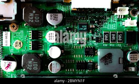 Capacitors on a Painted Circuit Board. Computer Circuit Board Stock Photo