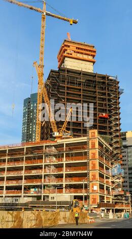 SEATTLE, WA, USA, - JUNE 2018: Tower crane working on a major new development in downtown Seattle. Stock Photo