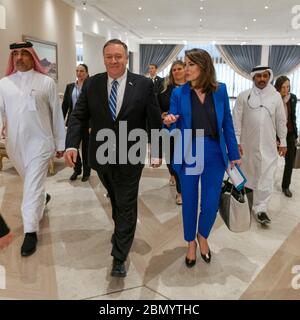 Secretary Pompeo and Spokesperson Ortagus Walk to the Signing Ceremony Secretary of State Michael R. Pompeo and Spokesperson Morgan Ortagus walk to the signing ceremony in Doha, Qatar, on February 29, 2020. Stock Photo