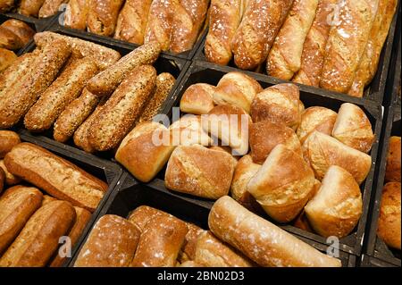 Display of various leavened breads in a store Stock Photo