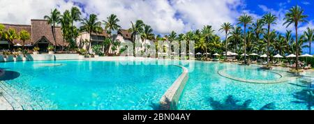 luxury 5 star resort territory with swimming pool and hotel rooms - Lux Bell mare resort . Mauritius island. Coastal Road, Belle Mare. February 2020 Stock Photo