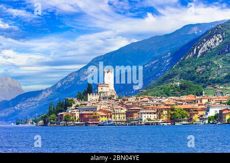 Lake Garda (Lago di Garda) is one of the most popular and beautiful lakes of Italy. View of Malcesine village. Stock Photo