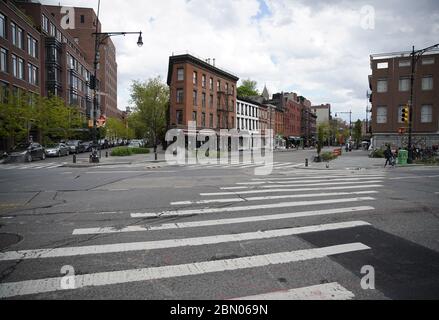 New York, United States. 11th May, 2020. Pedestrian and automobile traffic on an intersection of 7th Avenue remains almost non existent in New York City on Monday, May 11, 2020. The Coronavirus pandemic has killed over 20,000 people in New York City and has accounted for over 280, 00 deaths worldwide. Photo by John Angelillo/UPI Credit: UPI/Alamy Live News Stock Photo
