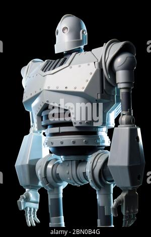 Vintage tin robot toy isolated on a black background. Stock Photo