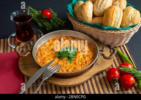 Traditional turkish food menemen, made by eggs, Stock Photo