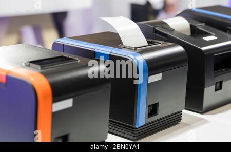 paper slip exit from thermal printer ; business background Stock Photo