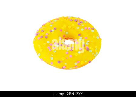 Yummy yellow donut isolated on white background. Stock Photo