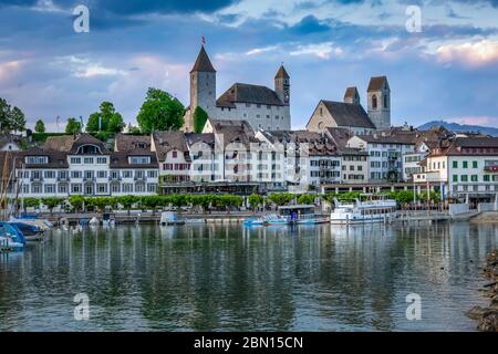 View of the Rapperswil harbour and altstadt (old city) dominated by its castle and Stadtpfarrkirche (St. John's Church), Rapperswil-Jona, St. Gallen, Stock Photo