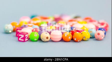 Brightly coloured plastic beads for children Stock Photo