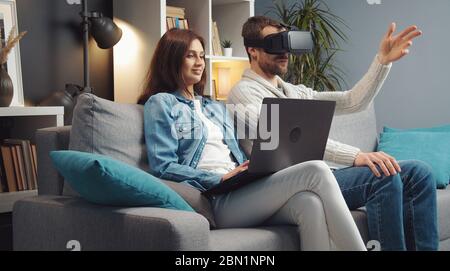 Couple having fun with VR-glasses Stock Photo