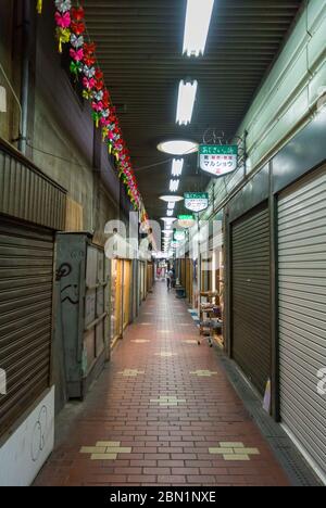 Motomachi, Sannomiya, Hyogo/ Japan: Kokashita: historic shopping arcade under jr kobe line which is deserted today Stock Photo
