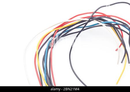 Copper cables of various colors, transmission of electric current through copper cables protected by colored plastics. Stock Photo