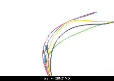 Copper cables of various colors, transmission of electric current through copper cables protected by colored plastics. Stock Photo