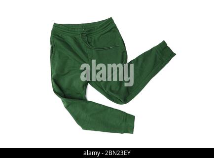Close-up green sport pants, sweatpants, jogging for men isolated on white background Stock Photo