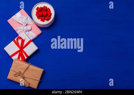 lots of multicolored gifts on the holiday background for inscriptions Stock Photo