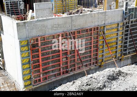 2 May 2020 - Felsberg, GR / Switzerland: large construction site with a subfloor cellar in concrete and shuttering panels in place Stock Photo