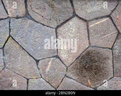 Stone wall mosaic stone background sandstone Stock Photo