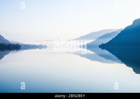 A tranquil early morning on Ullswater in the Lake District National Park, Cumbria, UK Stock Photo