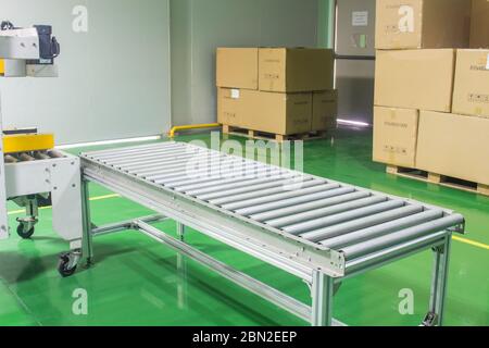 roller conveyor, Production line conveyor roller transportation objects. Stock Photo