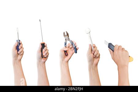 Hands holding different tools isolated on white background. object with clipping path. Stock Photo