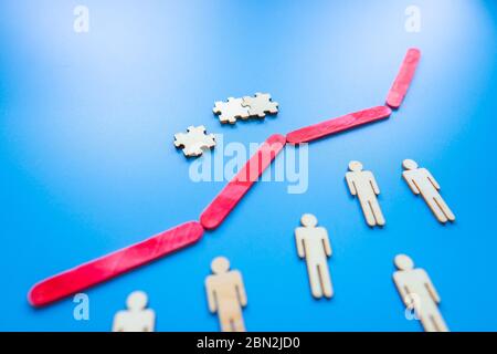 Growth bar chart, Graph diagram made with wooden sticks isolated on blue background and space for text. Business progress strategy, sales and marketin Stock Photo
