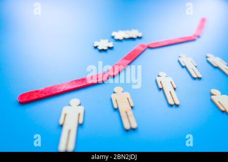 Growth bar chart, Graph diagram made with wooden sticks isolated on blue background and space for text. Business progress strategy, sales and marketin Stock Photo