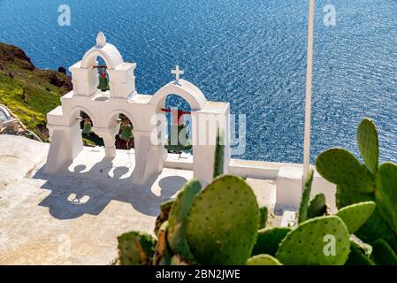 Bell towers from Oia, Santorini during the summer. Stock Photo