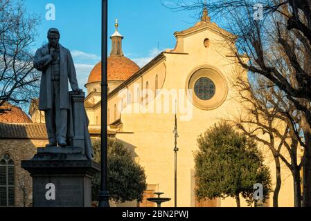 the popular piazza Santo Spirito of Florence in the warm light of late afternoon Stock Photo