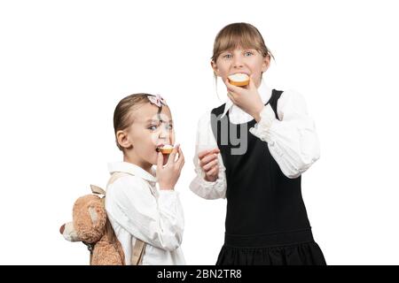 Children bite bread with sour cream isolated on a white background Stock Photo