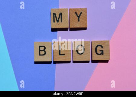 My Blog, words in wooden alphabet letters isolated on colorful background Stock Photo