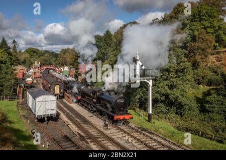 BR 'J27' 0-6-0 No. 65894 and NE 'Q6' 0-8-0 No. 2238, Goathland on the North Yorkshire Moors Railway during their Autumn Steam Gala Stock Photo