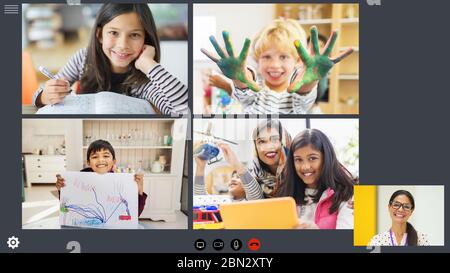 Teacher and students video conferencing during COVID-19 quarantine Stock Photo