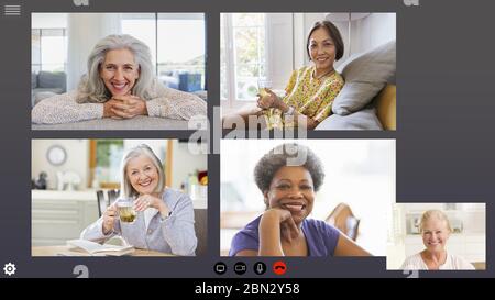 Senior women friends video conferencing during COVID-19 quarantine Stock Photo