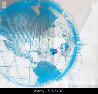 Scientists in clean suits studying global coronavirus pandemic Stock Photo