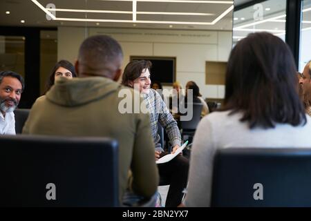 Business people talking in conference room meeting Stock Photo