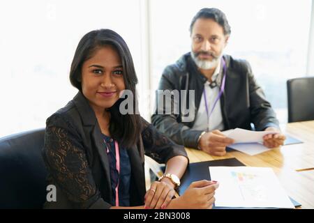 Portrait confident business people in meeting Stock Photo