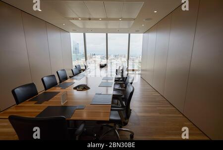 Long wood conference room table Stock Photo