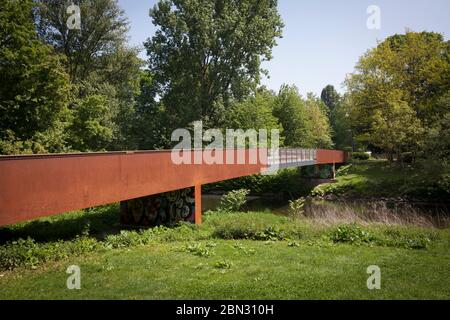 bridge-over-the-river-wupper-in-the-ludwig-rehbock-park-in-the-district