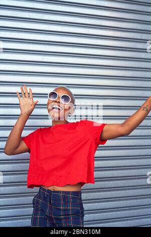Portrait carefree young woman in sunglasses Stock Photo
