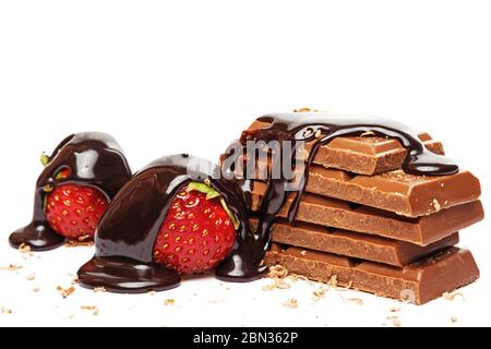 Strawberry and chocolate covored with sweet syrup on white background