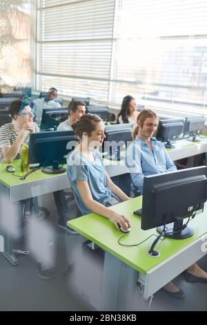 Students learn computer science in a university computer course Stock Photo