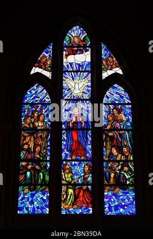 Stained glass window in Almudena Cathedral in Madrid, Spain Stock Photo