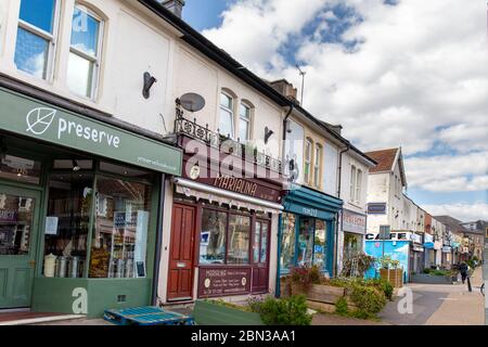 Stores in old houses in the A38 Gloucester Road in Bishopston, Bristol, is a vibrant street full of independent cafes and retail local businesses Stock Photo