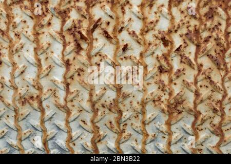 metal diamond plate with rusty texture Stock Photo