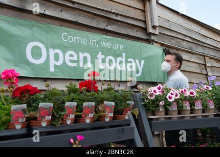 Dorney, Buckinghamshire, UK. 12th May, 2020. Staff at the Crocus Garden Centre at Dorney Court prepare to reopen tomorrow 13th May 2020 following their temporary closure during the Coronavirus Covid-19 Pandemic lockdown. Crocus is in the grounds of the historic Dorney Court Tudor Manor House which has been used in many film locations. Credit: Maureen McLean/Alamy Live News Stock Photo