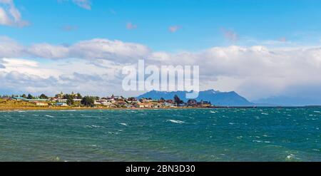 Cityscape of Puerto Natales city by the Last Hope Sound in Patagonia. Stock Photo