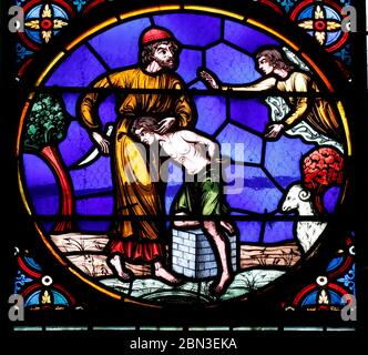 Sacred Heart Basilica.  Stained glass window. God asks Abraham to sacrifice his son, Isaac. Paray le Monial. France. Stock Photo
