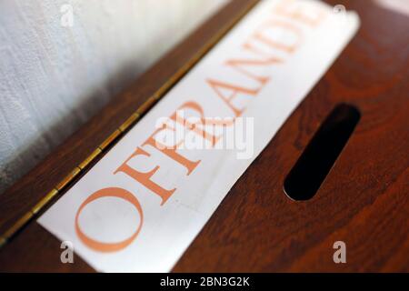 Protestant Evangelical Church. Offerings box. Cluses. France. Stock Photo